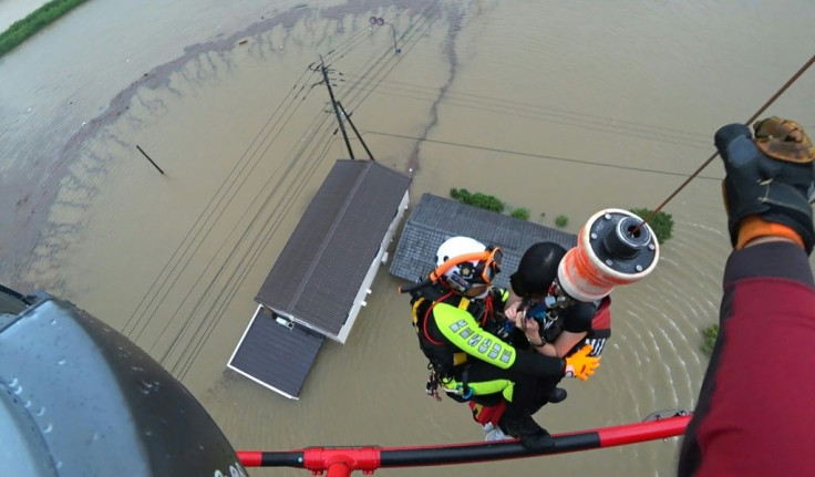 Images from Saga prefecture showed aviation rescue teams winching people to safety