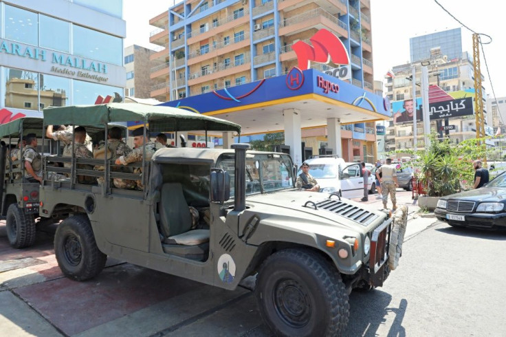Lebanese soldiers are at a petrol station in the capital Beirut on Saturday