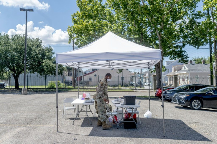 A temporary vaccination site in a parking lot in the Treme neighborhood of New Orleans did less business than a nearby virus testing center