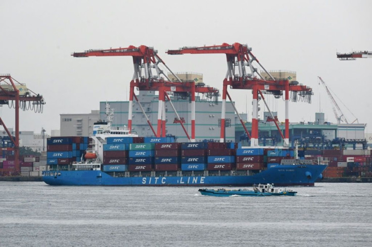 Japan's economy grew slightly in the second quarter, avoiding a technical recession despite continued virus woes