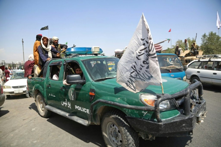 Taliban fighters patrol the streets of Kabul, after a stunningly swift end to Afghanistan's 20-year war