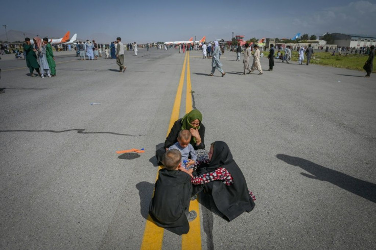 Many Afghans have been unable to secure exit visas in time to flee the country, but have rushed to the Kabul airport hoping to leave ahead of Taliban rule