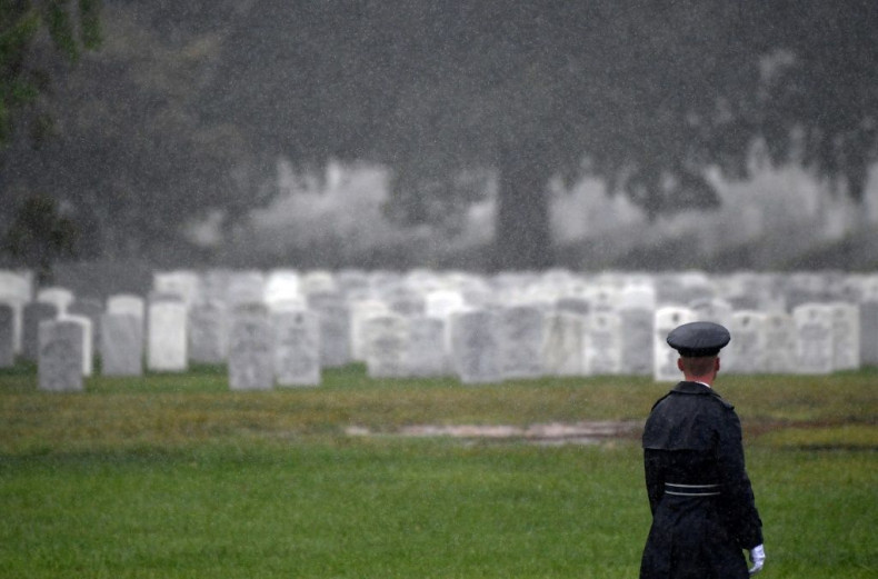 A member of the Old Guard looks on during a full military honors burial for a US soldier next to Section 60, the area of Arlington National Cemetery near the US capital reserved for those killed during the wars in Iraq and Afghanistan