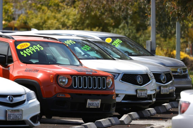 Auto sales plunged in July though Americans spent more at bars and restaurants, government data said
