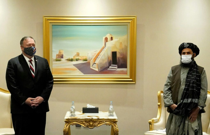 The then US secretary of state Mike Pompeo meets in November 2020 in Doha, Qatar with Taliban co-founder Mullah Abdul Ghani Baradar, who is now poised to rule Afghanistan