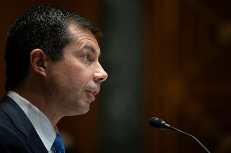 US Transportation Secretary Pete Buttigieg, seen here in Washington in June of 2021, said he and his husband were becoming parents