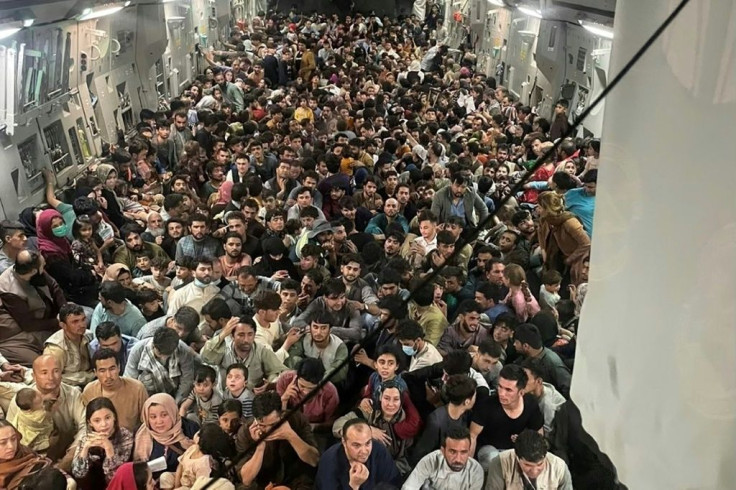 A US Air Force C-17 is seen loaded with some 640 Afghans fleeing Afghanistan after the Taliban takeover