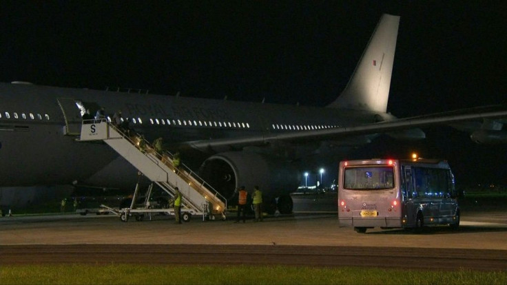 IMAGES Evacuees from Afghanistan disembark from a UK military plane which landed in Brize Norton.The Taliban took effective control of the country Sunday when president Ashraf Ghani fled and the insurgents walked into Kabul with no opposition. It cappe