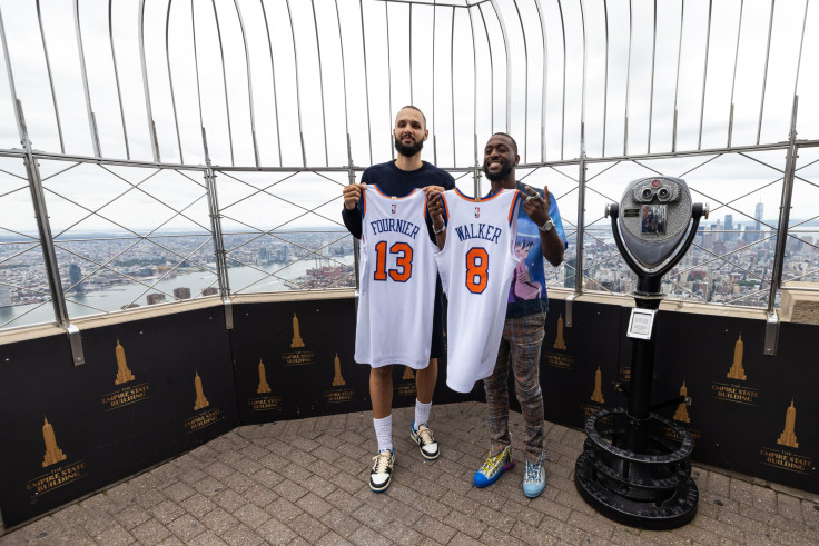 Evan Fournier #13 and Kemba Walker #8 of the New York Knicks 