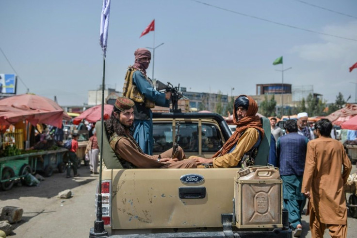 Taliban fighters patrol the streets of Kabul