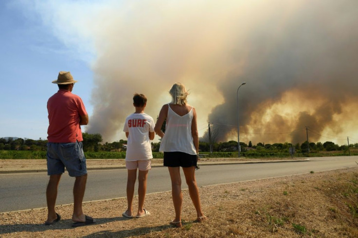 High temperatures and strong winds forced local authorities to evacuate around 7,000 people from homes and campsites