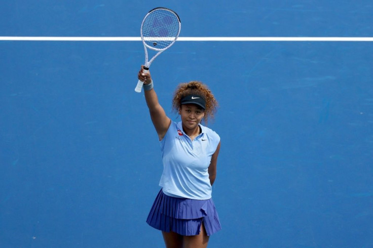 Japan's Naomi Osaka celebrates a victory Wednesday over American Coco Gauff at the WTA Cincinnati Masters