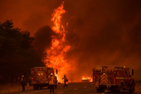 The Dixie Fire has now consumed more than 600,000 acres of California, one of dozens of blazes raging across the state