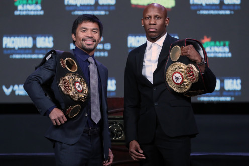 Manny Pacquiao (L) and WBA welterweight champion Yordenis Ugas 