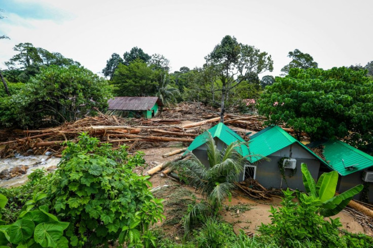 Streets and houses were swamped and cars were washed away