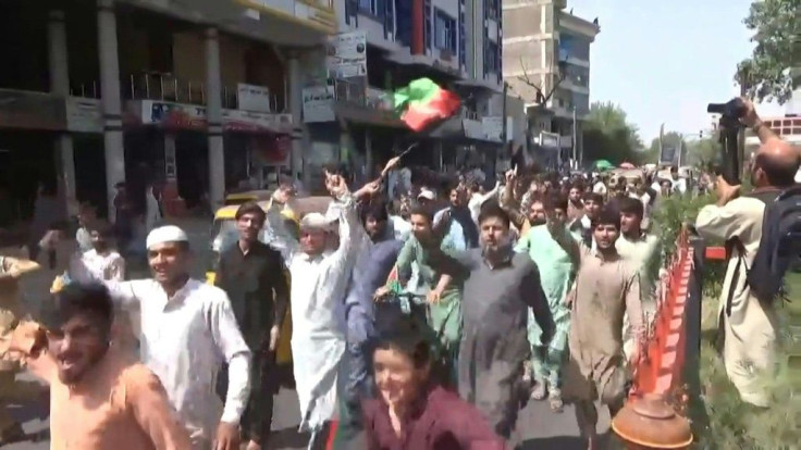 Firing is heard in Jalalabad as residents protest over the removal of Afghan flags that were replaced with that of the Taliban, according to local media, after the group's takeover of Afghanistan after being ousted by a US-led invasion in 2001.