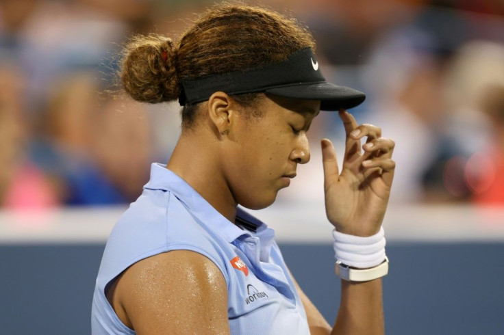 Japan's Naomi Osaka lost to Swiss Jil Teichmann on Thursday in a third-round match at the WTA Cincinnati Masters