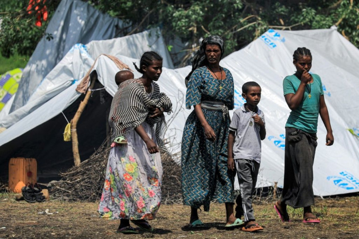 Many Ethiopian refugees are living in basic conditions with plastic sheeting for shelter in Sudan