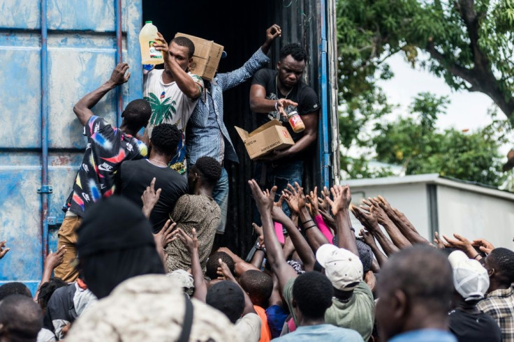 Tumultuous aid handouts underscore the desperation caused by last week's powerful tremor, which killed over 2,000 people