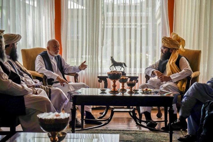 The Haqqani network leader's younger brother Anas Haqqani (R) has held talks with former president Hamid Karzai after the fall of Kabul