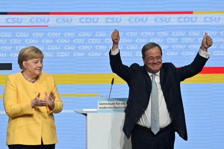 German Chancellor Angela Merkel gave her backing to would-be successor Armin Laschet ahead of elections next month