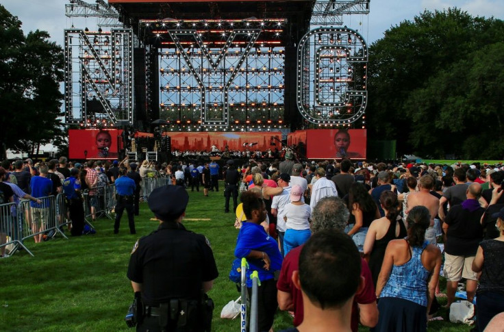 People streamed onto Central Park's Great Lawn Saturday afternoon, as the New York Philharmonic played rousing renditions of classics including 'New York, New York'