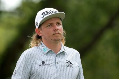 Australian Cameron Smith fired an 11-under par 60 on Saturday to set a course record at Liberty National in the third round of the US PGA Northern Trust tournament
