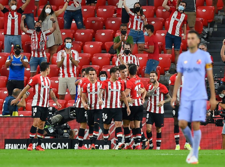 Athletic Bilbao players celebrate after Inigo Martinez put them in front at San Mames