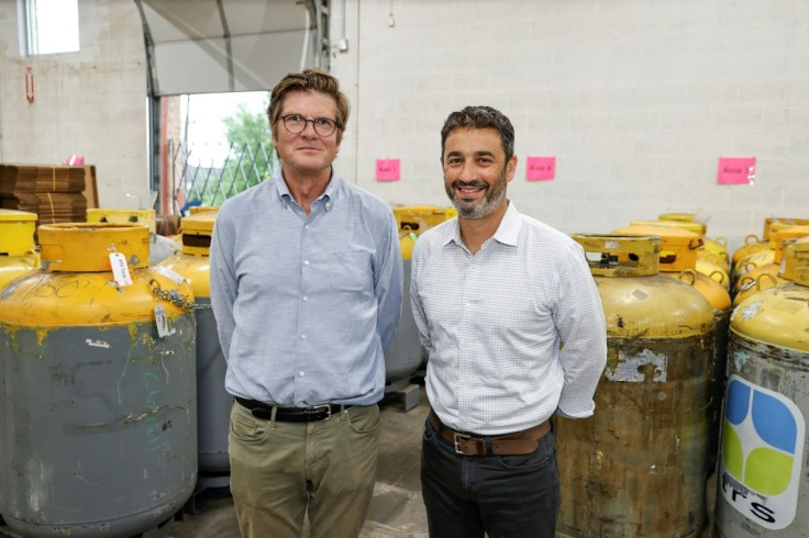 Tim Brown (L) and Gabriel Plotkin (R) of Tradewater pose for a picture at their warehouse in Elk Grove Village, Illinois
