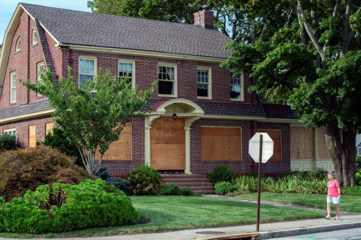 Homes were boarded up in Connecticut as Hurricane Henri steams towards the US east coast