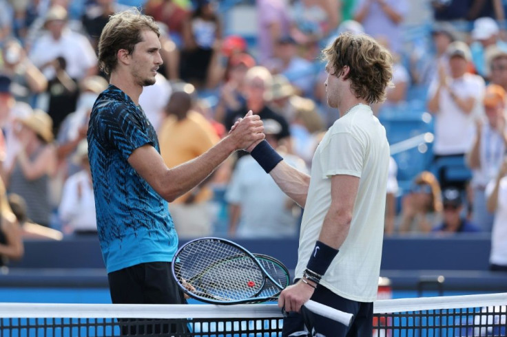 Old friends: Germany's Alexander Zverev shakes hands with Andrey Rublev after beating the Russian in the final of the ATP Cincinnati Masters