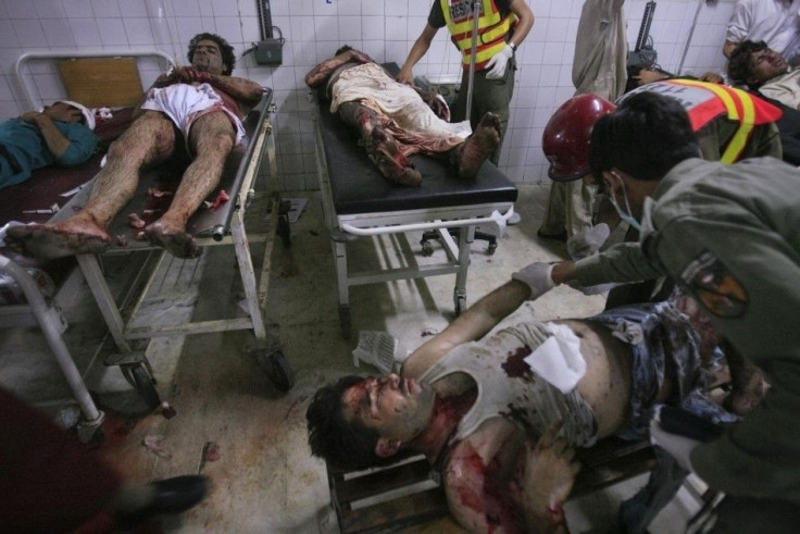 Injured victims of multiple bomb blasts await treatment after arriving at the Lady Reading hospital in Peshawar