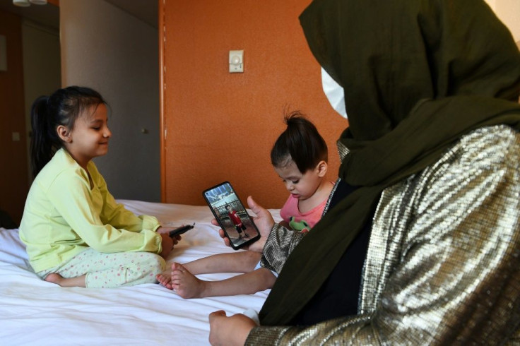Maryam made it out of Kabul with two of her three children. Separately, her husband managed to get to Uzbekistan with their eldest son
