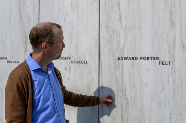 Gordon Felt, president of the "Families of Flight 93" organization, looks at the name of his brother on the memorial at Shanksville, Pennsylvania