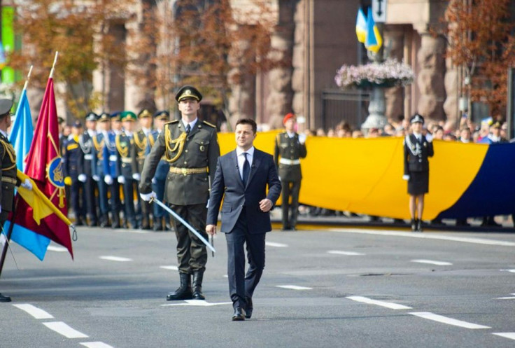 Ukrainian President Volodymyr Zelensky marched in the Independence Day military parade watched by thousands of spectators waving Ukrainian blue-and-yellow flags