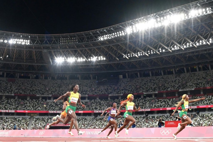 Elaine Thompson-Herah, right, and the two Jamaican compatriots who followed her home for Olympic 100m medals, Shelly-Ann Fraser-Pryce and Shericka Jackson (L) in the women's Olympic 100m final