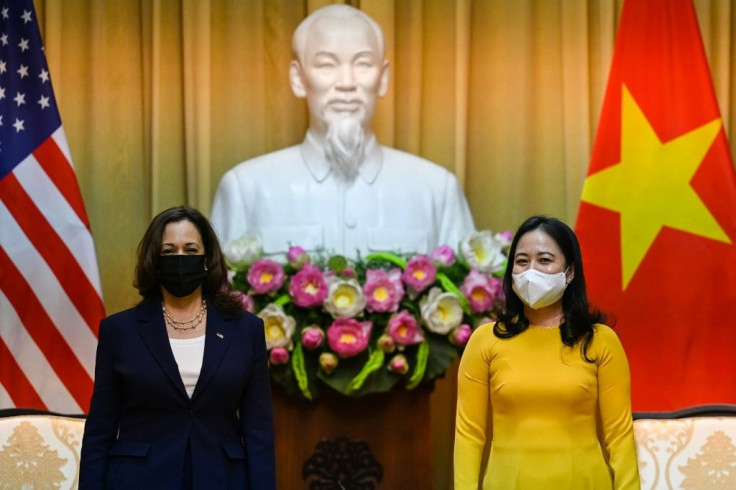 Vice President Kamala Harris (L, with Vietnam's Vice President Vo Thi Anh Xuan) is using her trip to stress US commitment to Asia