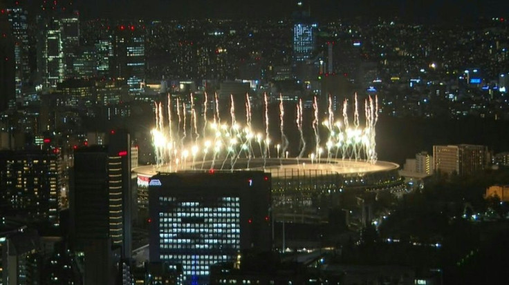 IMAGES Fireworks are released at the Japan National Stadium as the Opening Ceremony for the postponed Tokyo 2020 Paralympic Games gets under way.