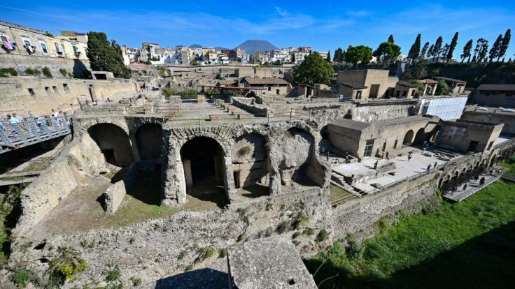 A general view shows the archaeological site of Herculaneum in Ercolano, near Naples, with the Mount Vesuvius volcano in the background