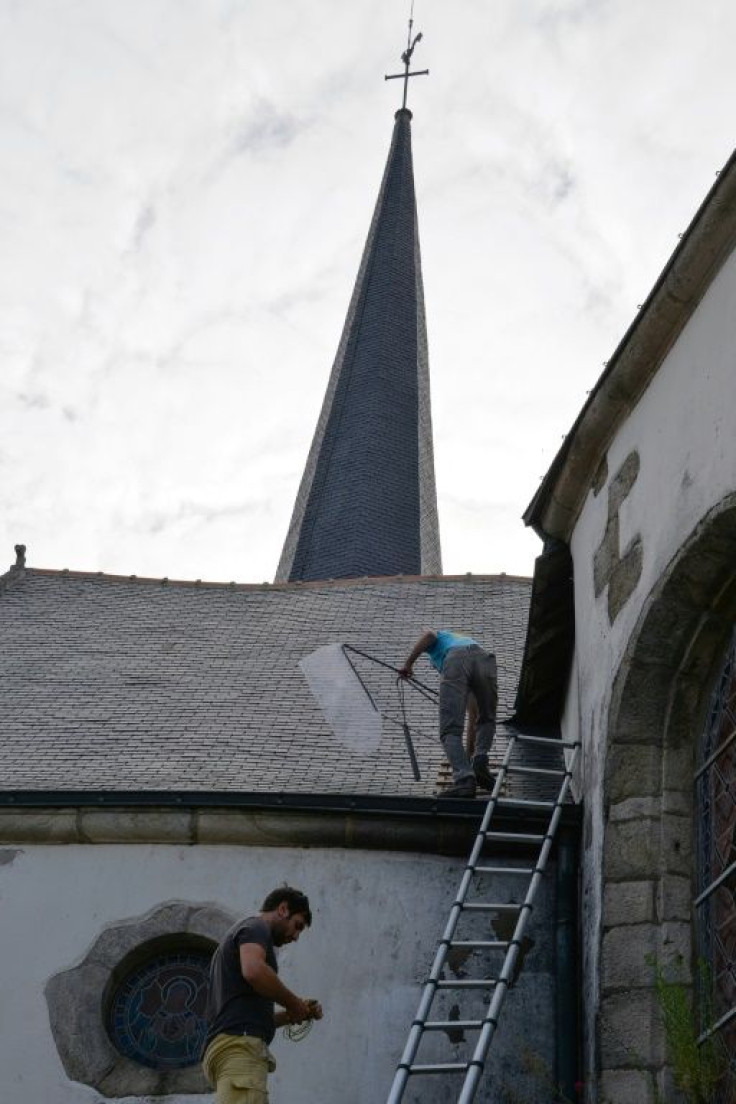 At Saint Martin's church in Noyal-Muzillac, Brittany, volunteers and scientists painstakingly examine each bat