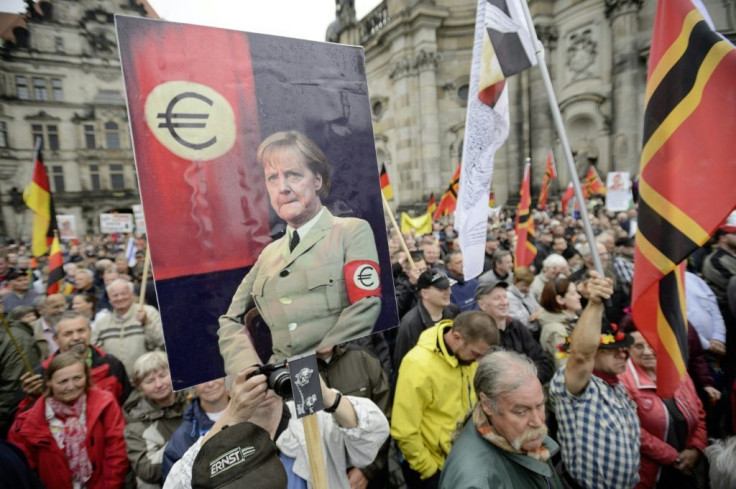 Protesters in Germany and Greece were angry over Merkel's handling of the eurozone debt crisis