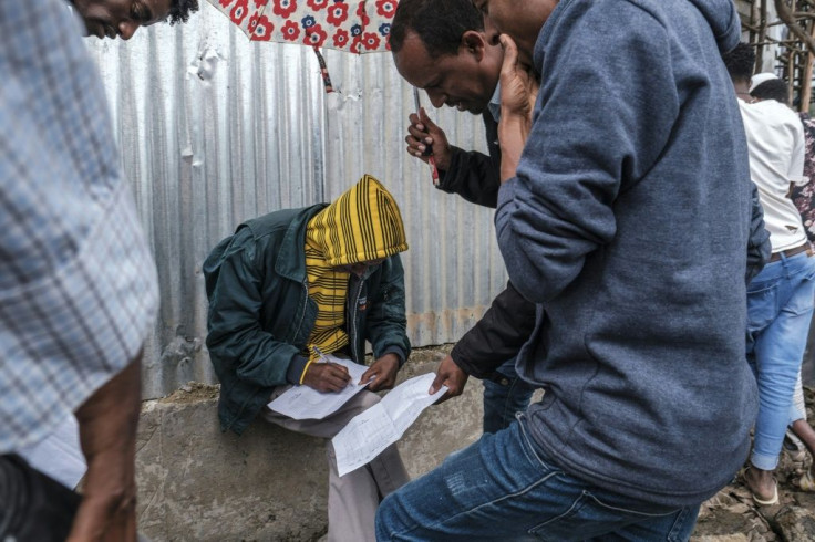 People register for food distribution in Dessie