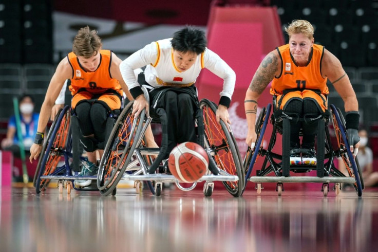 China battles the Netherlands' in the women's wheelchair basketball preliminary round group B match in Toky
