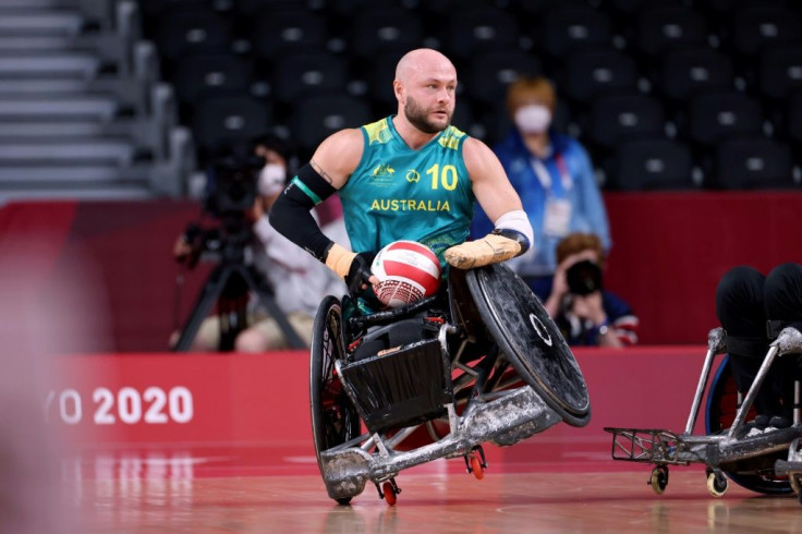Australia's Chris Bond grabs the ball during the pool phase group A wheelchair rugby match against Denmark