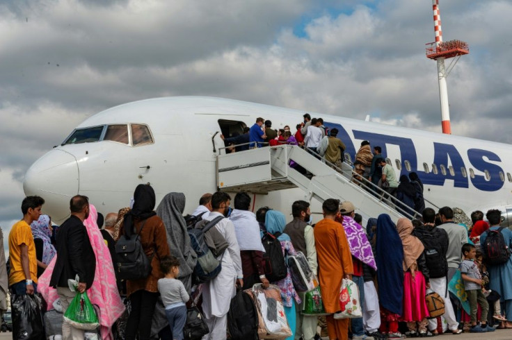 Evacuees board a plane on Ramstein air base bound for the United States