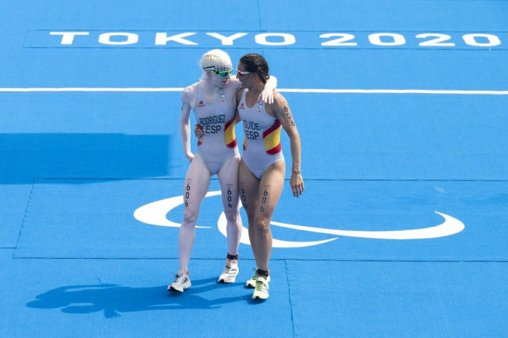Spain's Susana Rodriguez and her guide Sara Loehr compete in the women's triathlon at the Tokyo Paralympics