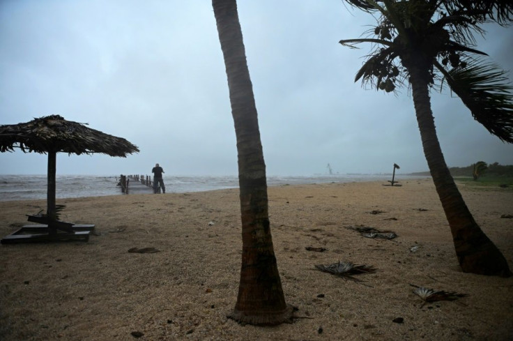 Hurricane Ida passed through eastern Cuba on Friday, forcing thousands to evacuate their homes