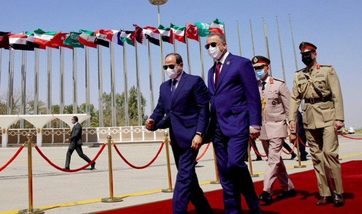 Iraqi Prime Minister Mustafa al-Kadhemi receives Egyptian President Abdel Fattah al-Sisi in Baghdad, one of several leaders at a regional summit, seen here in a photograph released by Iraq's Prime Minister's Media Office