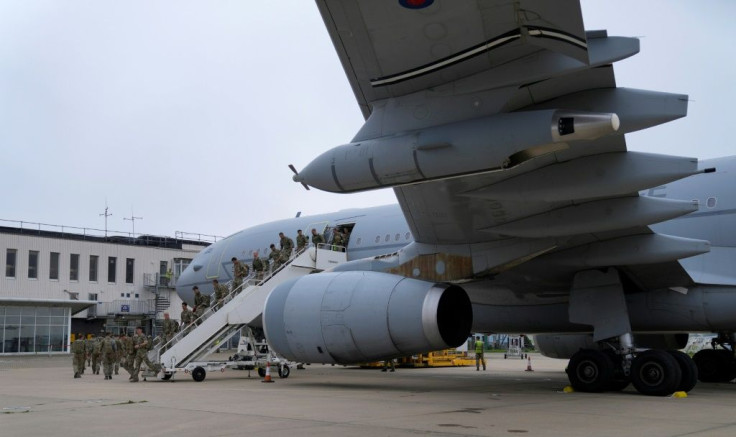 British troops disembark after a flight from Kabul to Brize Norton air force base in Oxfordshire