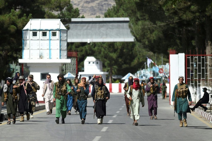 Taliban fighters in the grounds of Kabul's airport